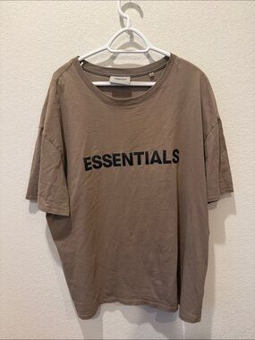 ESSENTIALS Men's Short Sleeve Logo Tee in Taupe with Black Print